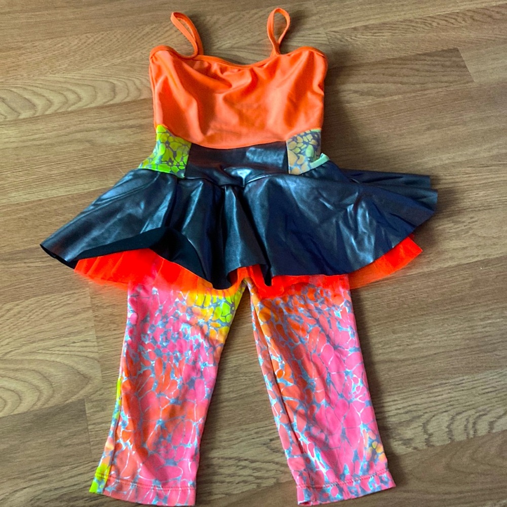 This is a kids tap costume in an ombré color fade